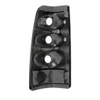 Raxiom 99-02 Chevrolet Silverado 1500 Fleetside Axial Series Tail Lights- Black- Smoked Lens