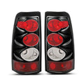 Raxiom 03-06 Chevrolet Silverado 1500 Fleetside Axial Series Tail Lights- Black- Clear Lens
