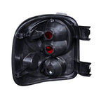 Raxiom 99-02 Chevrolet Silverado 1500 Stepside Axial Series Tail Lights- Black Housing- Clear Lens