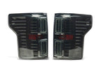 Raxiom 15-17 Ford F-150 CXR Series LED Tail Lights- Black Housing- Smoked Lens