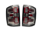 Raxiom 14-18 Chevrolet Silverado 1500 LED Tail Lights/SeqTurn Signals- Chrome- Smoked Lens