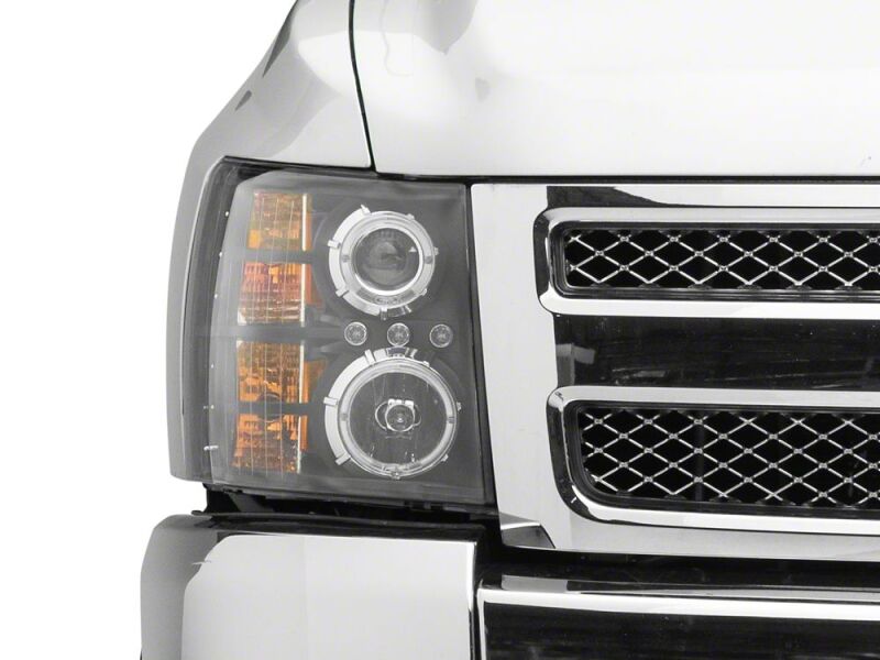 Raxiom 07-13 Chevrolet Silverado 1500 LED Halo Projector Headlights- Black Housing- Clear Lens