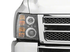 Raxiom 07-13 Chevrolet Silverado 1500 LED Halo Projector Headlights- Black Housing- Clear Lens