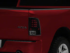 Raxiom 09-18 Dodge RAM 1500 LED Tail Lights- Black Housing- Clear Lens