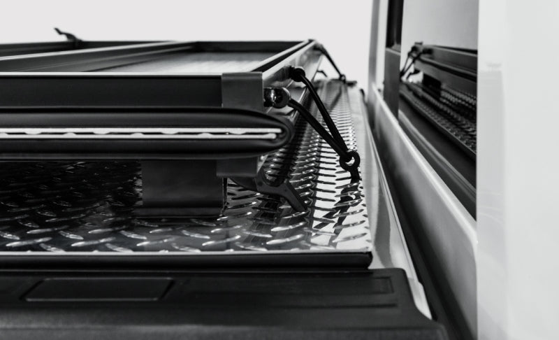 Access LOMAX 2022+ Rivian R1T 4ft 6in Bed (w/ OEM Tonneau Track) Folding Hard Cover - Carbon Fiber