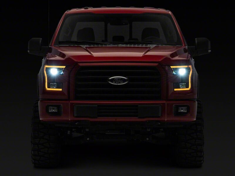 Raxiom 15-17 Ford F-150 LED Projector Headlights with LED Amber DRL- Black Housing- Clear Lens