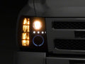 Raxiom 07-13 Chevrolet Silverado 1500 LED Halo Projector Headlights- Black Housing- Clear Lens
