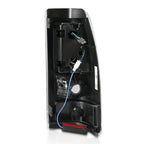 Raxiom 03-06 Chevrolet Silverado 1500 Fleetside Axial Series LED Tail Lights- Black - Clear Lens