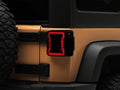 Raxiom 07-18 Jeep Wrangler JK Axial Series JL Style LED Tail Lights- Black Housing- Smoked Lens