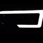 Raxiom 99-06 Chevrolet Sierra 1500 Axial Series LED DRL Headlights- Black Housing- Clear Lens